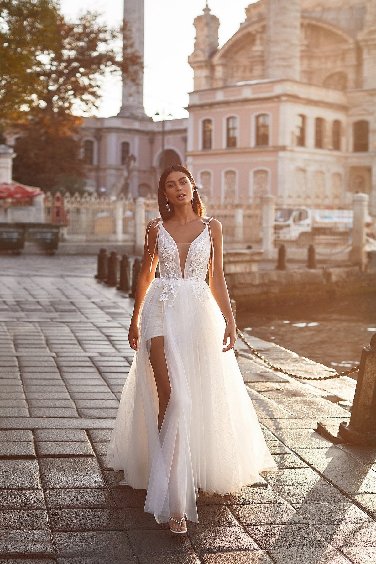 sanem white dress Sana L / / Spring 2025 while the sheer panels and cutouts add an alluring touch of drama White Asymmetric Draped Dress